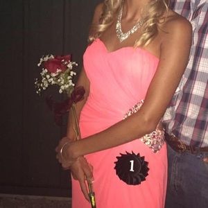 Flowy, open back coral dress